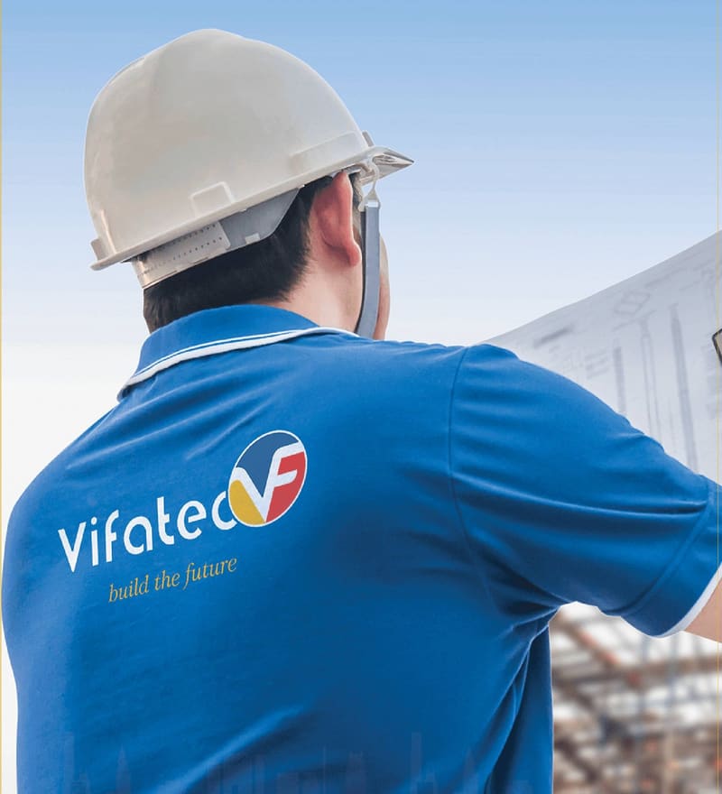 Vifatec engineer in company helmet and polo shirt